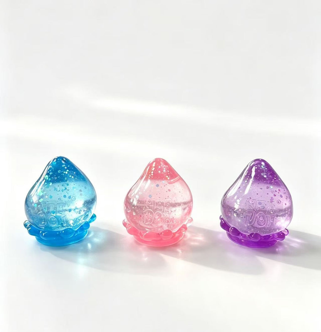 Schylling NeeDoh Dream Drop Squishy Stress Ball, Glitter Water Drop Squeeze Fidget Toy